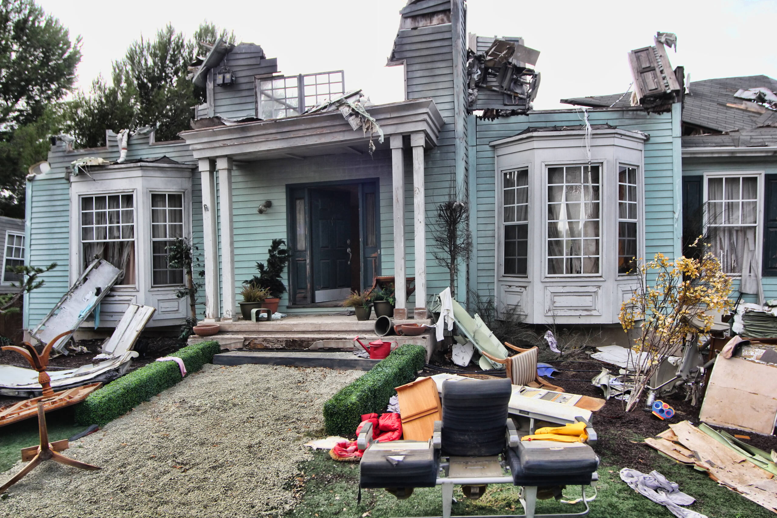 House damaged by disaster. Scenery for cinema